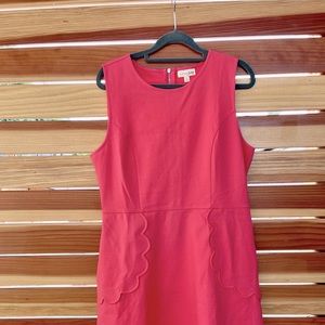 Used Sleeveless Fuschia colored dress with cute pockets by Maison Jules. Size L